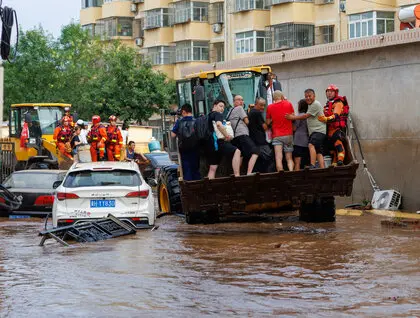 Повінь у Китаї - тропічний шторм спричинив масштабні руйнування - фото 6